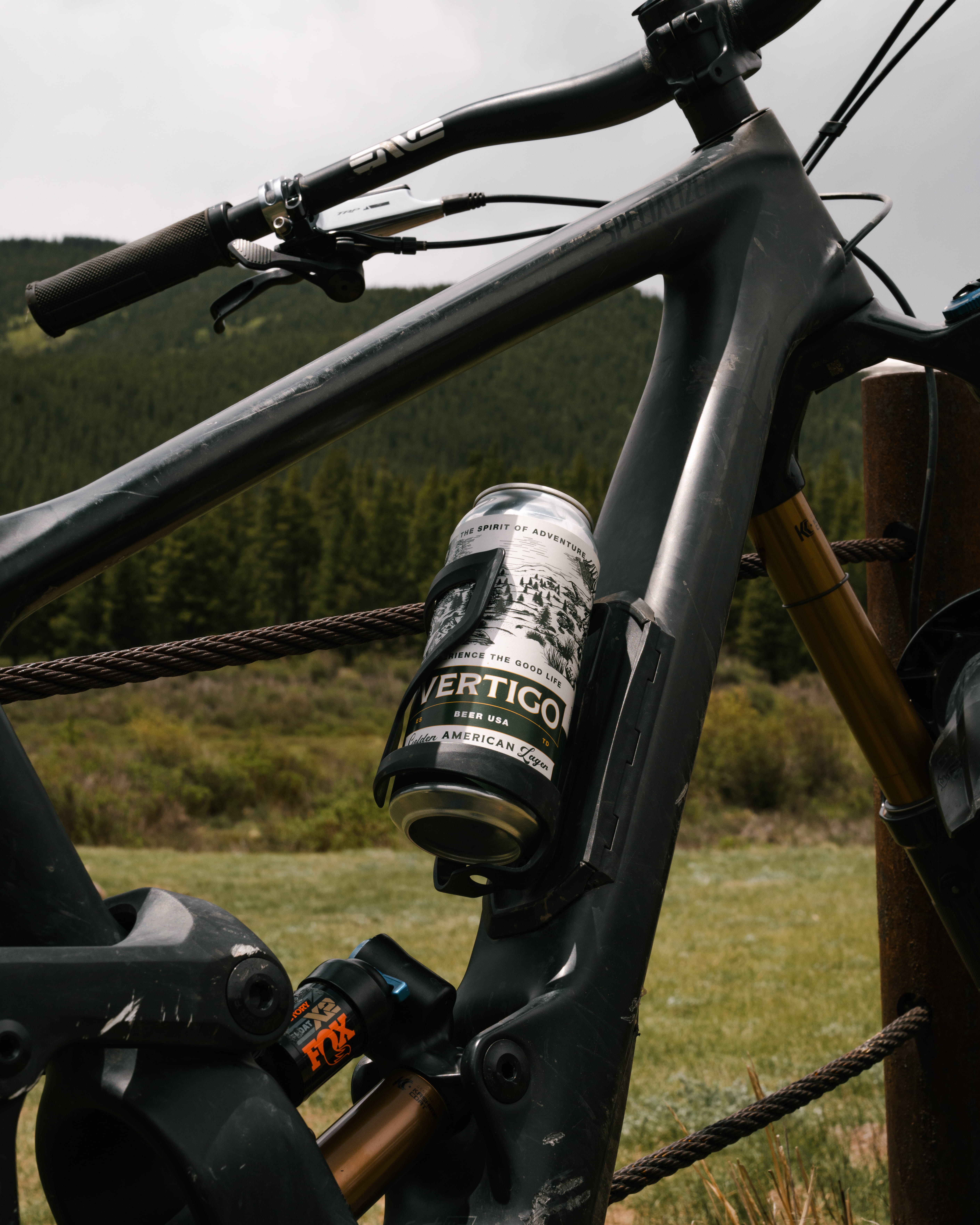Can sitting in bicycle bottle holder